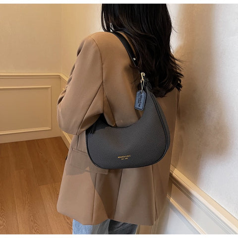 Elegant Halbmond-Schultertasche