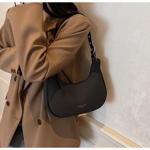 Elegant Halbmond-Schultertasche