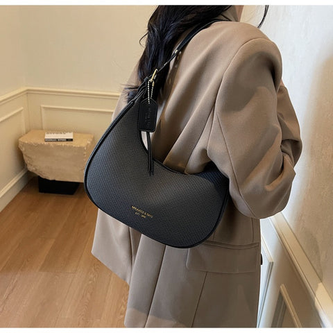 Elegant Halbmond-Schultertasche