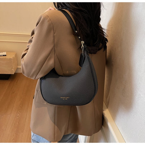 Elegant Halbmond-Schultertasche
